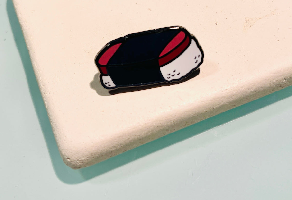 Pop-Up Mākeke - Mahea Leah - Spam Musubi Enamel Pin - Front View