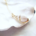 Pop-Up Mākeke - Flotsam & Co. - 24kt Gold Dipped Spiral Shell Necklace - Side View