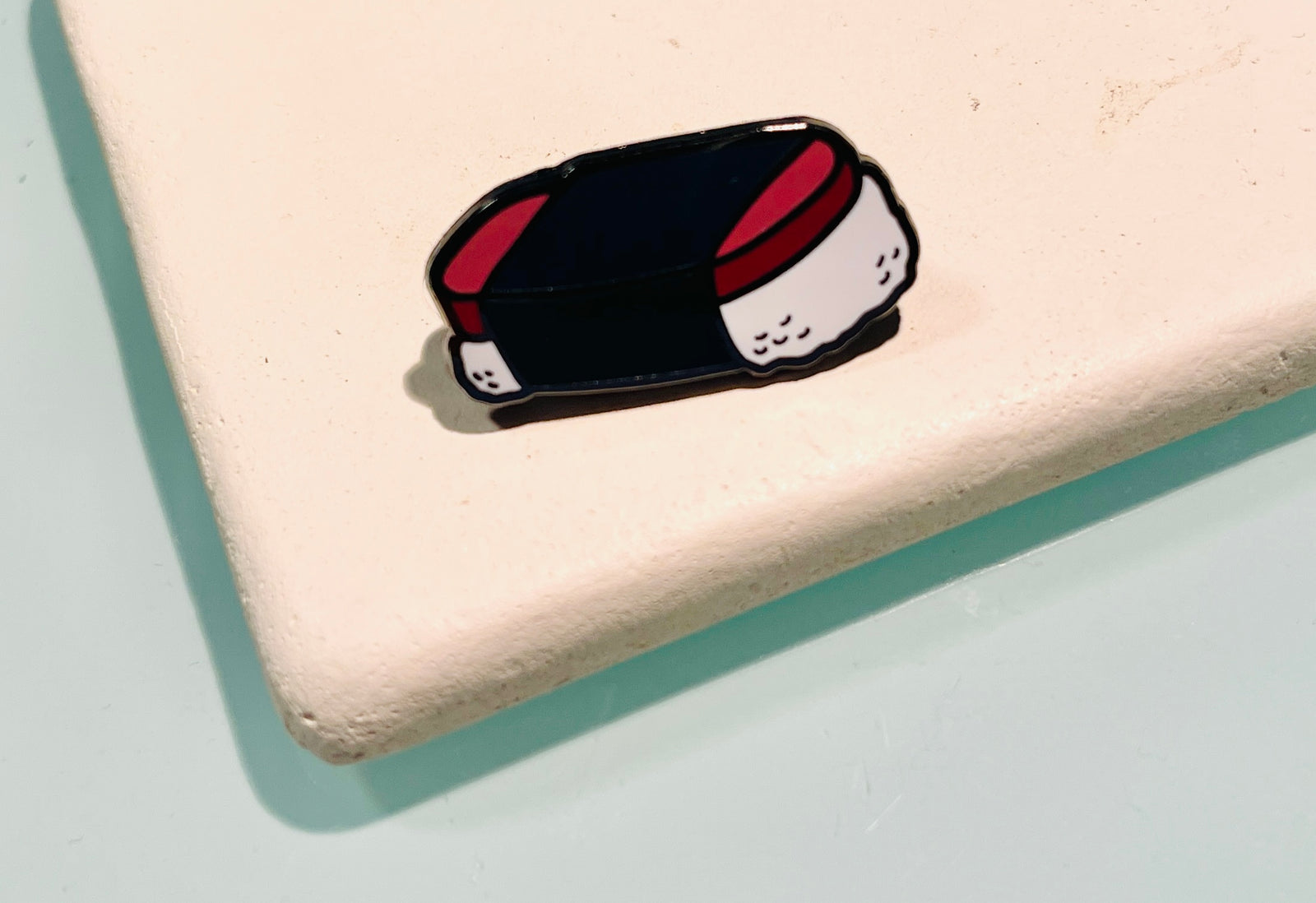 Pop-Up Mākeke - Mahea Leah - Spam Musubi Enamel Pin - Front View