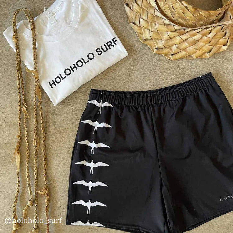 Pop-Up Mākeke - Onepaʻa Hawaiʻi - Kāne Activewear Shorts - Au I Ke Kai ʻEleʻele - In Use